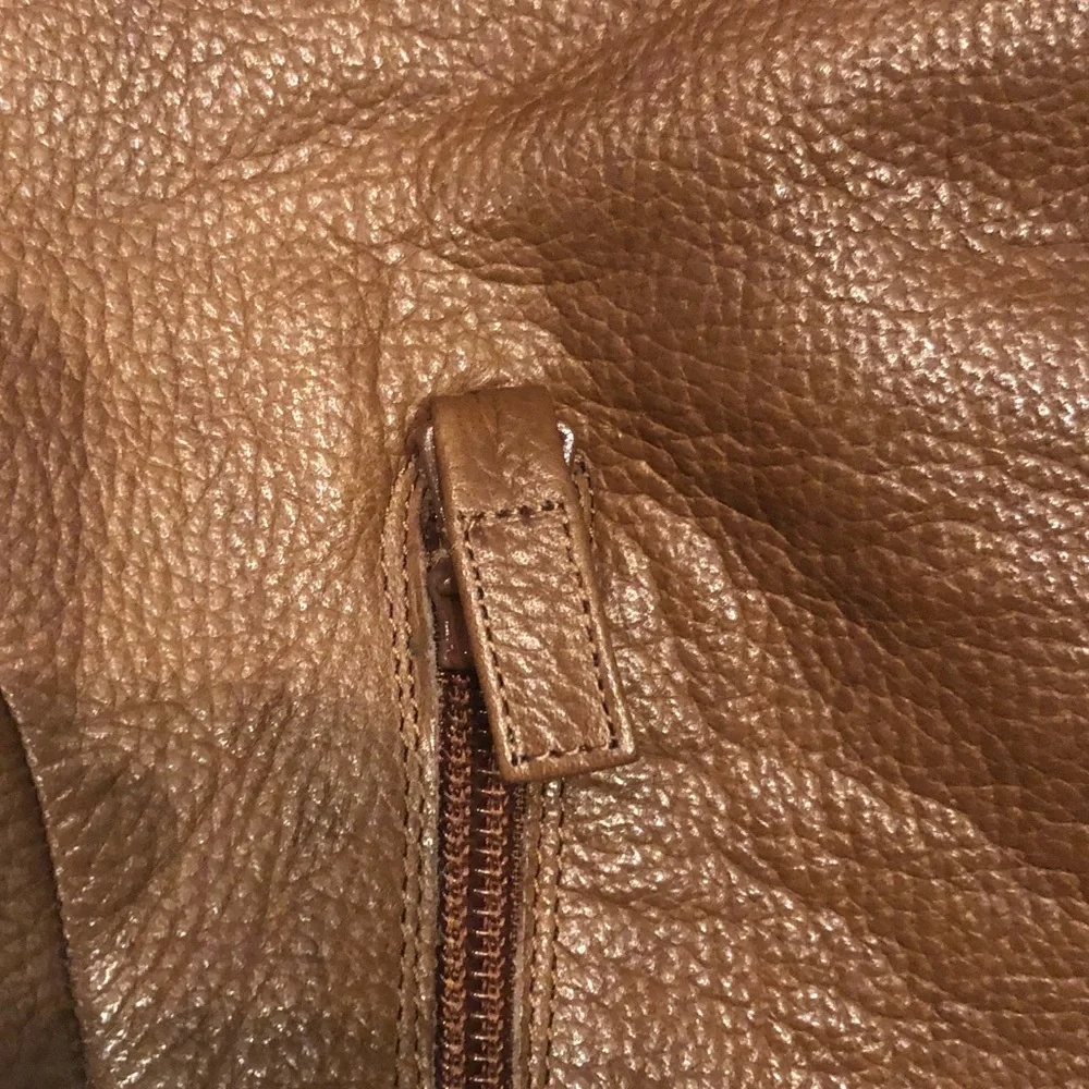 HP! Rosegold Boots in Cognac Leather with Fold Over Tops. Inside zip. Size 39.